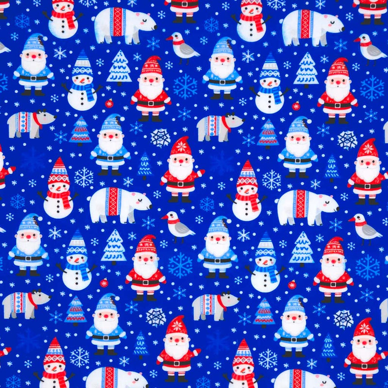 Pattern of Santa Claus, polar bears, snowmen, and birds on a blue polycotton fabric with snowflakes.