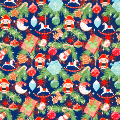 Christmas decorations printed on a navy blue polycotton fabric