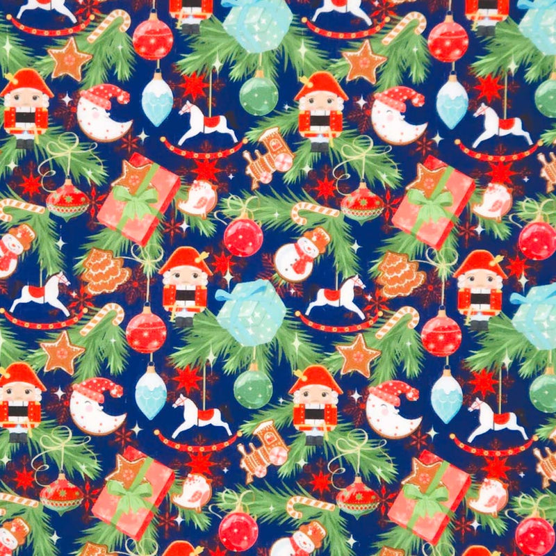 Christmas decorations printed on a navy blue polycotton fabric