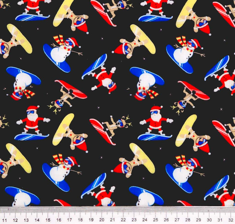Snowboarding chrismas characters printed on a black polycotton fabric with a cm ruler