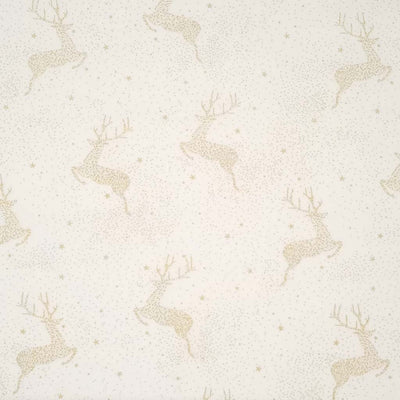 Christmas reindeer design that is made entirely of clustered gold dots and stars to create a frosty, wintery sky scape pattern printed on a cream 100% cotton fabric.