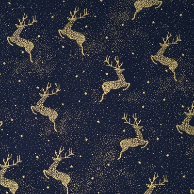 A Christmas reindeer design that is made entirely of clustered gold dots and stars to create a frosty, wintery sky scape pattern printed on a navy 100% cotton fabric