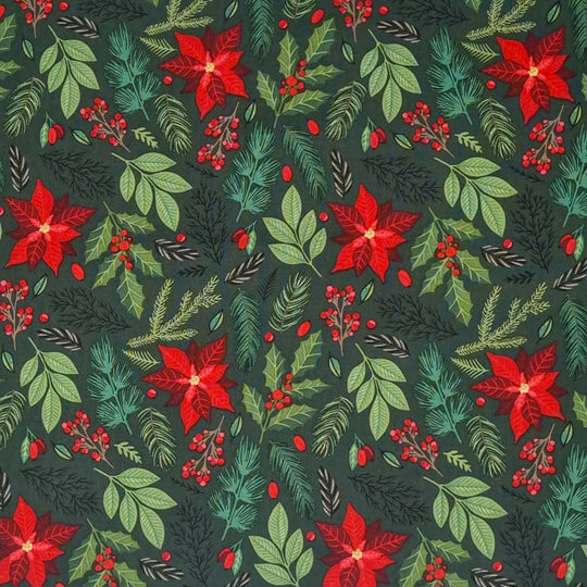 Poinsettia and mixed Christmas leaves such as fern, holly and berries are printed on a bottle green, 100% cotton fabric by Rose & Hubble.