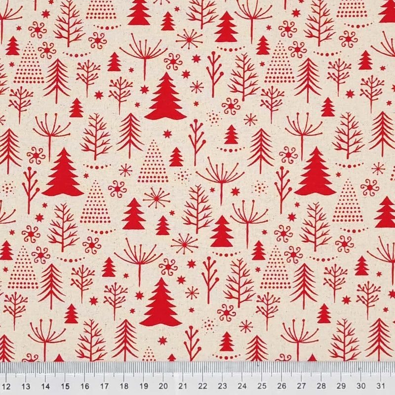 Red scandi christmas trees are printed on a natural cotton fabric