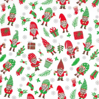 Gnomes and christmas presents are printed on a white polycotton fabric