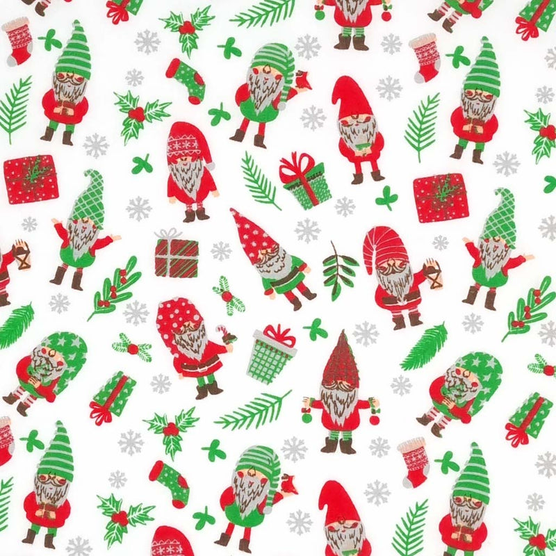 Gnomes and christmas presents are printed on a white polycotton fabric