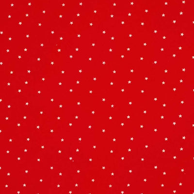 Mini white scattered stars printed on a red 100% cotton fabric