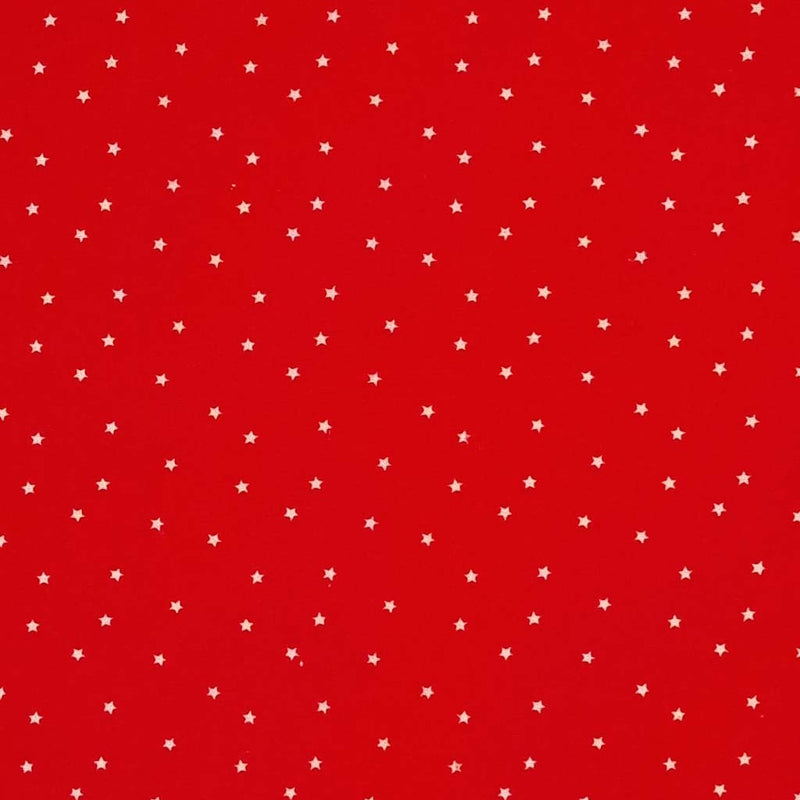 Mini white scattered stars printed on a red 100% cotton fabric