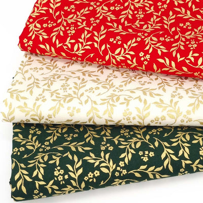 a traditional festive bundle of 3 cotton fabrics with gold metallic design features.