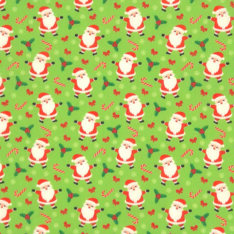 Santa and candy canes printed on a green polycotton fabric