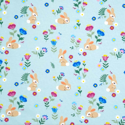 Baby bunnies printed on a jade cotton jersey fabric