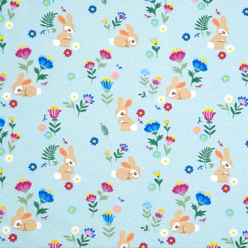 Baby bunnies printed on a jade cotton jersey fabric