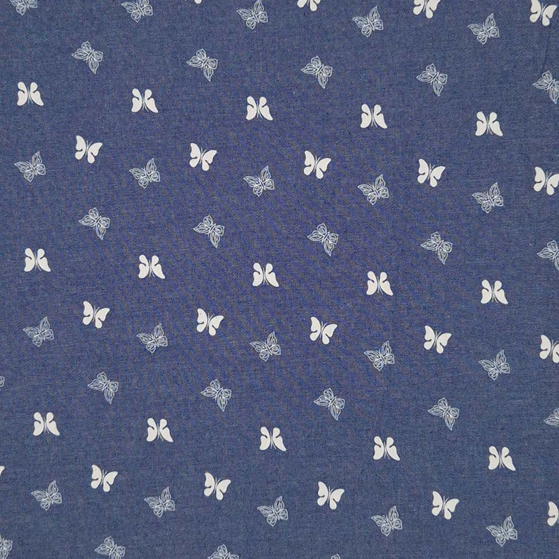 Mini butterflies printed on a cotton chambray fabric