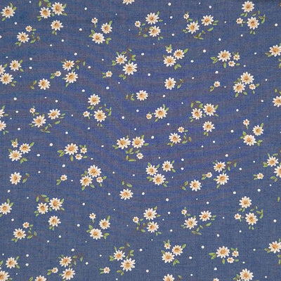 Ditsy daisies printed on a cotton denim chambray fabric