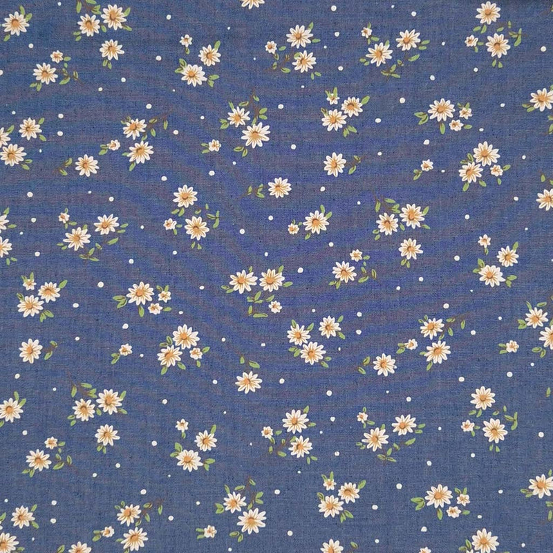 Ditsy daisies printed on a cotton denim chambray fabric