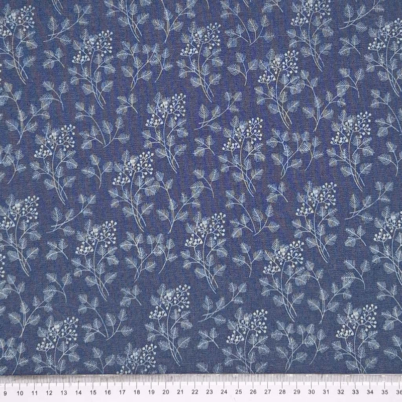 Floral fern design printed on a cotton denim chambray fabric with a cm ruler