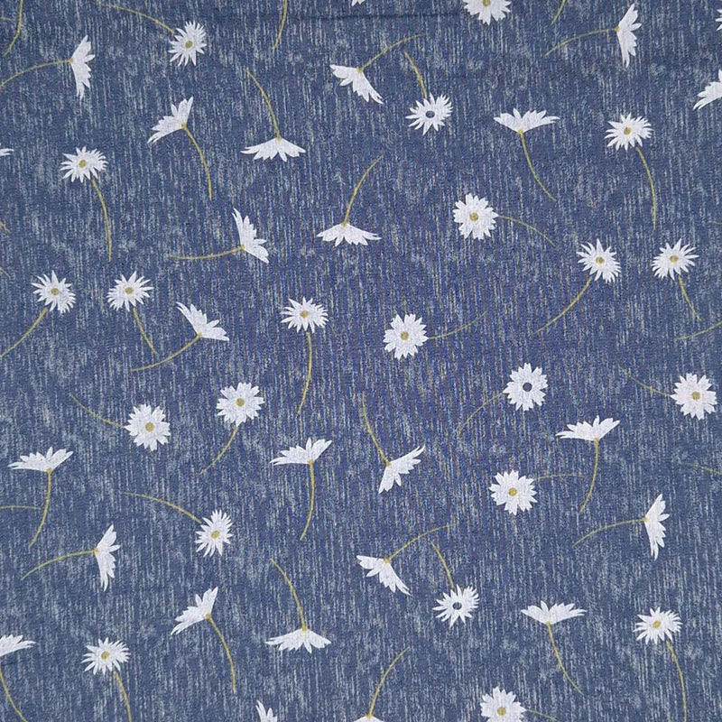 Daisies printed on a chambray fabric