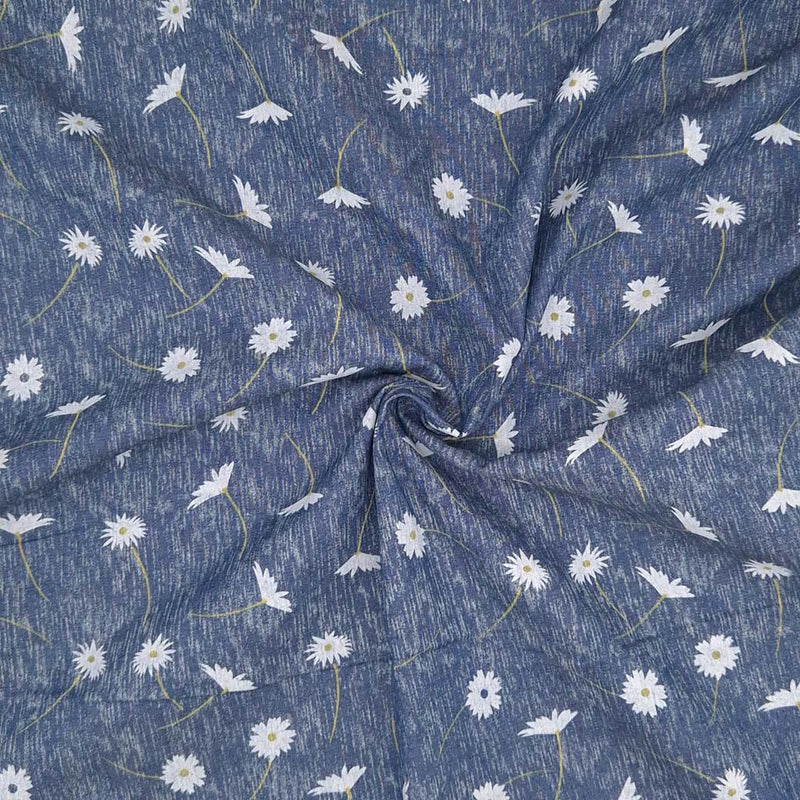 Daisies printed on a chambray fabric