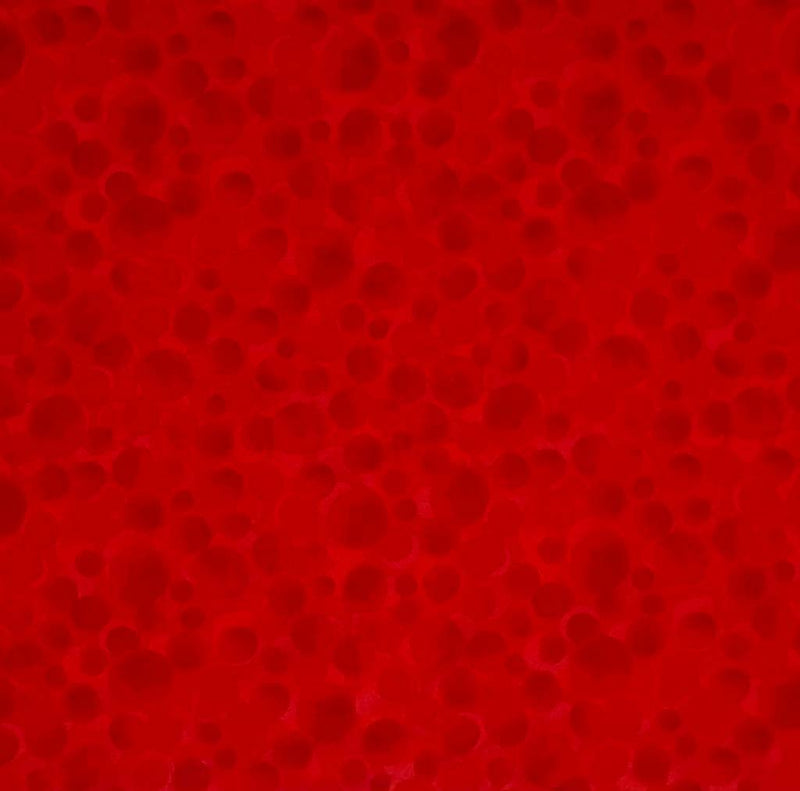 Multi-sized dots printed on a postbox red 100% cotton.