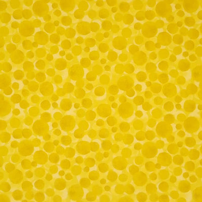 Multi-sized dots printed on a sunshine yellow 100% cotton.
