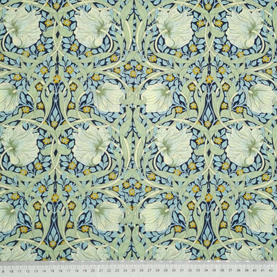 William Morris Pimpernel in navy and green printed on a pima cotton lawn with a cm ruler