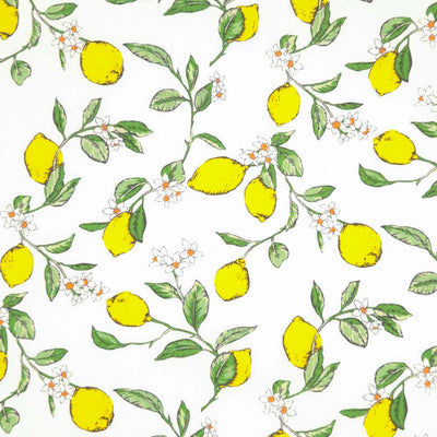 Lemons printed on an ivory cotton poplin fabric