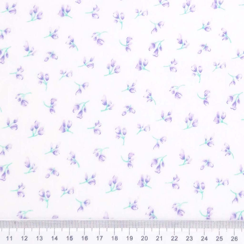 Floral pattern with small purple flowers on a white background