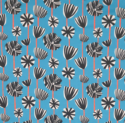 Dandelions printed on a petrol blue cotton jersey fabric