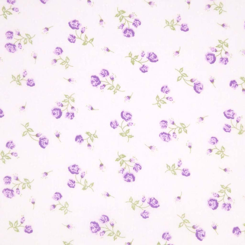 Pattern of small purple flowers on a white background