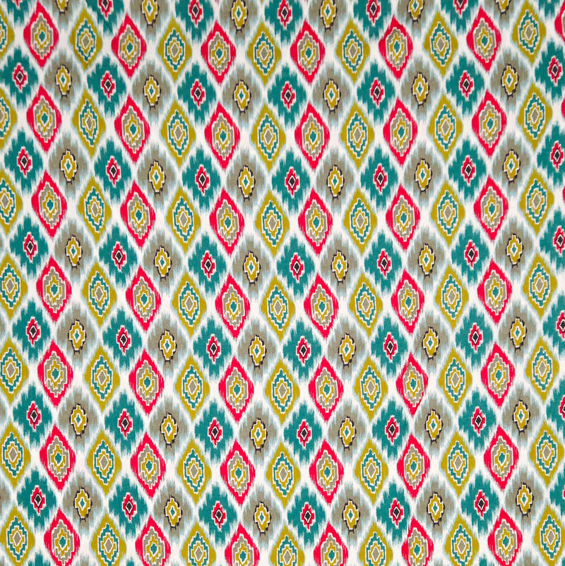 Patterned fabric with geometric design in red, yellow, and green on a blue viscose fabric