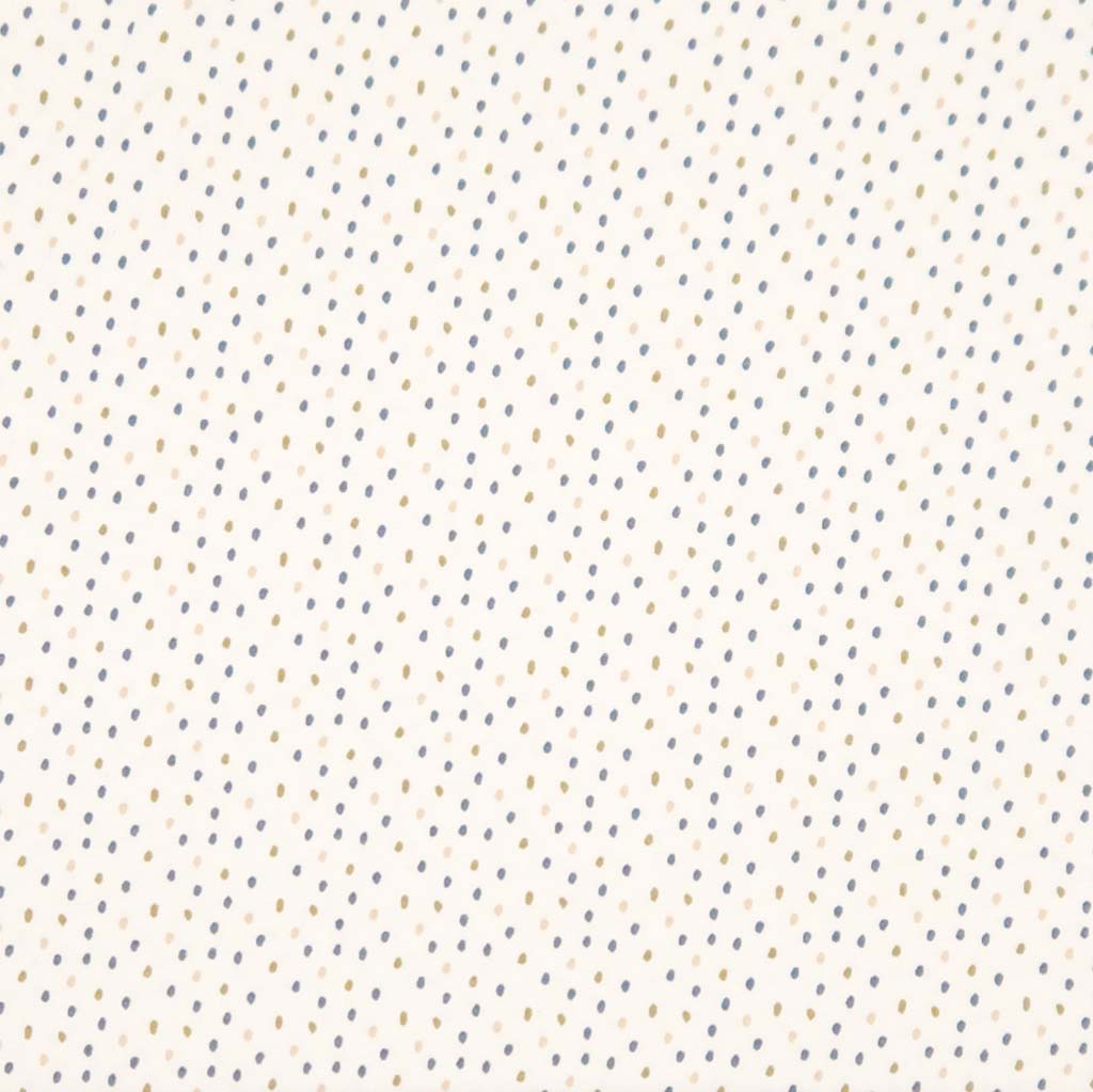 Ditsy dots printed on a cream cotton jersey fabric