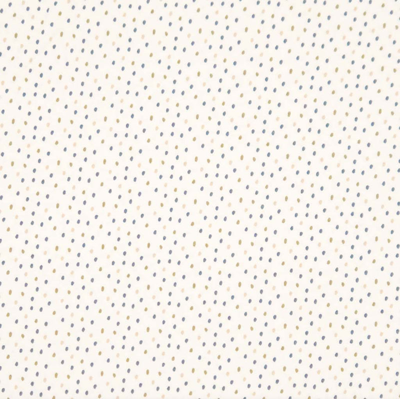 Ditsy dots printed on a cream cotton jersey fabric