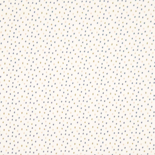 Ditsy dots printed on a cream cotton jersey fabric