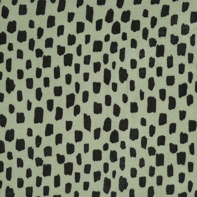 Black blocks are printed on an olive green double gauze fabric