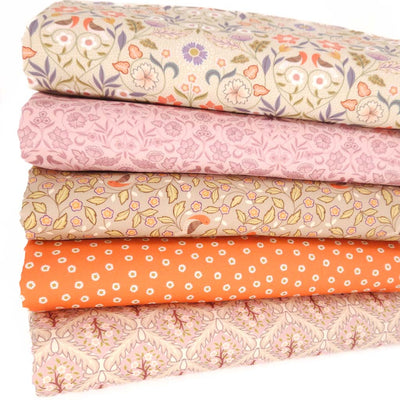 A floral fat quarter bundle in sage and lilac colourways