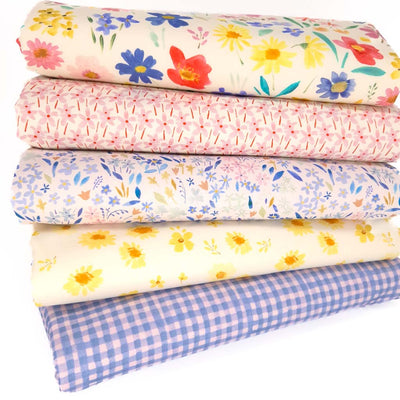 A cotton fat quarter bundle with floral fabrics by Lewis & Irene