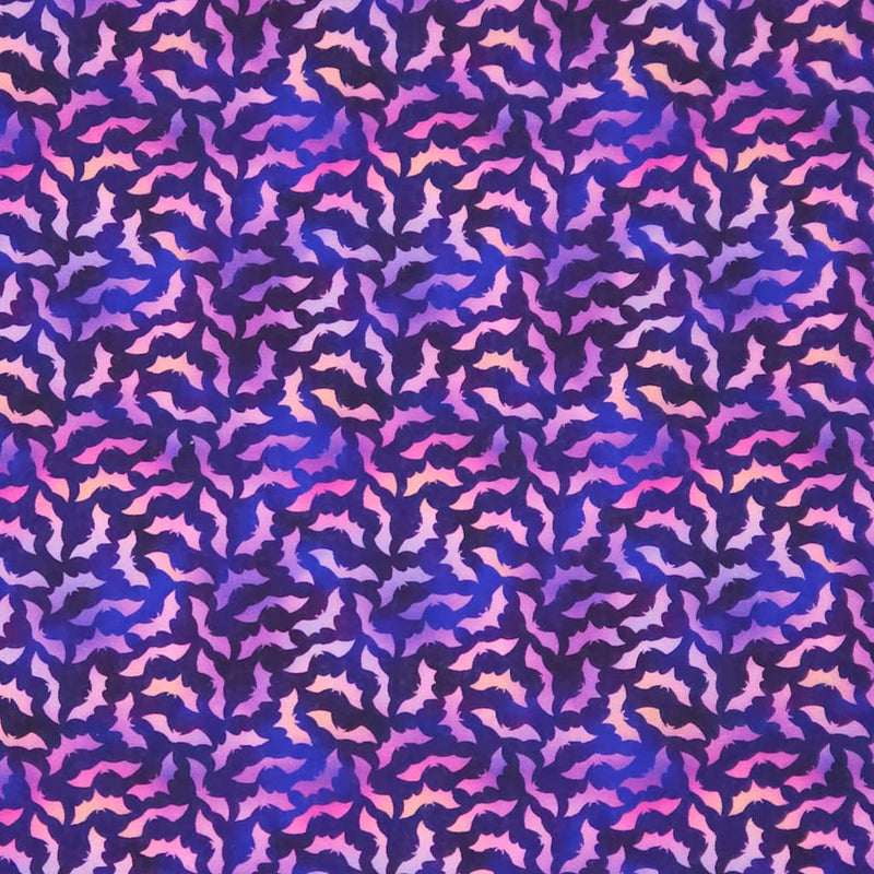 Patterned cotton halloween fabric with purple and pink bat design