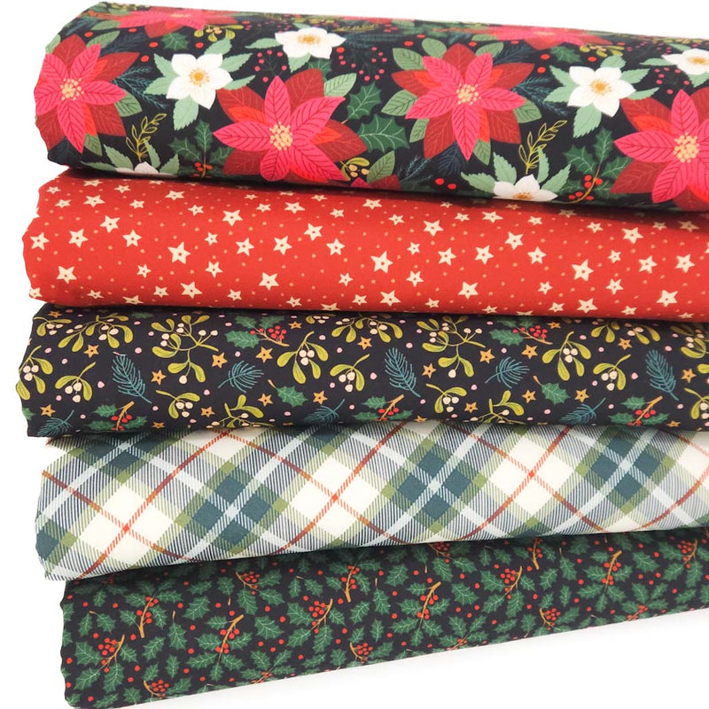 A christmas poinsettia and holly themed fat quarter bundle
