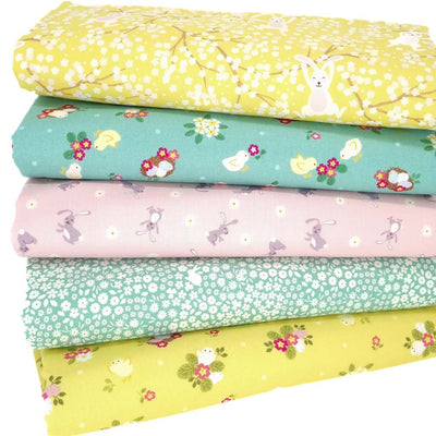 A bundle of 5 easter themed cotton quilting fabrics with bunnies and chicks