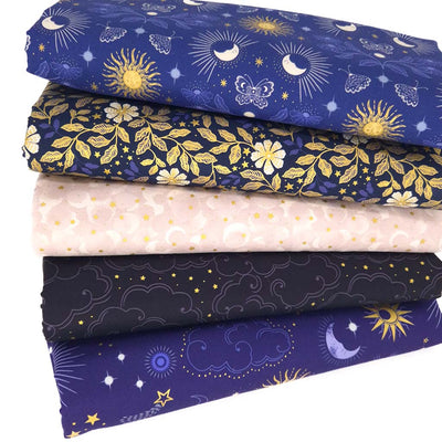 A cotton fat quarter bundle of celestial prints in blue