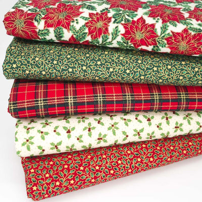 A festive fat quarter bundle of five christmas cotton fabrics with poinsettia, tartan and holly