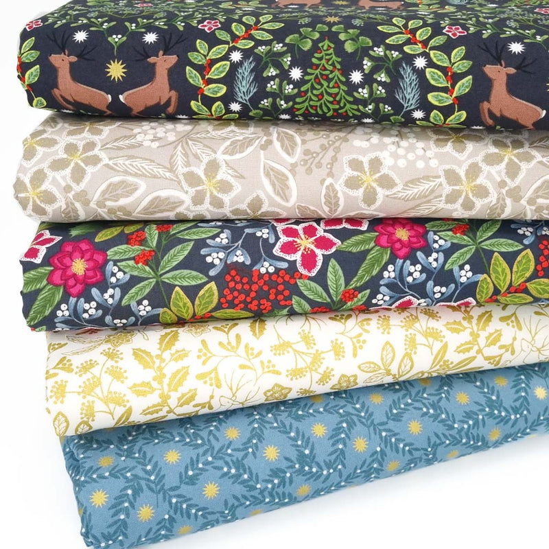 A christmas fat quarter bundle with reindeer and florals in a charcoal colourway by Lewis & Irene