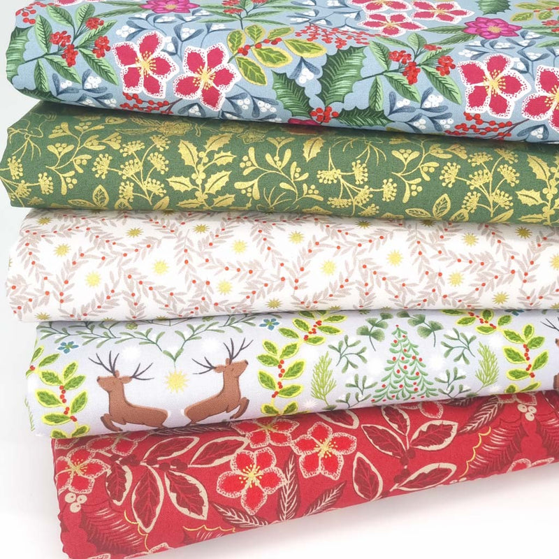 A christmas fat quarter bundle with reindeer and florals by Lewis & Irene