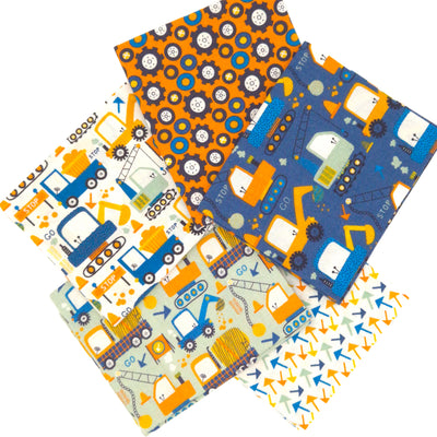 A fat quarter bundle of 5 digger themed fabric prints