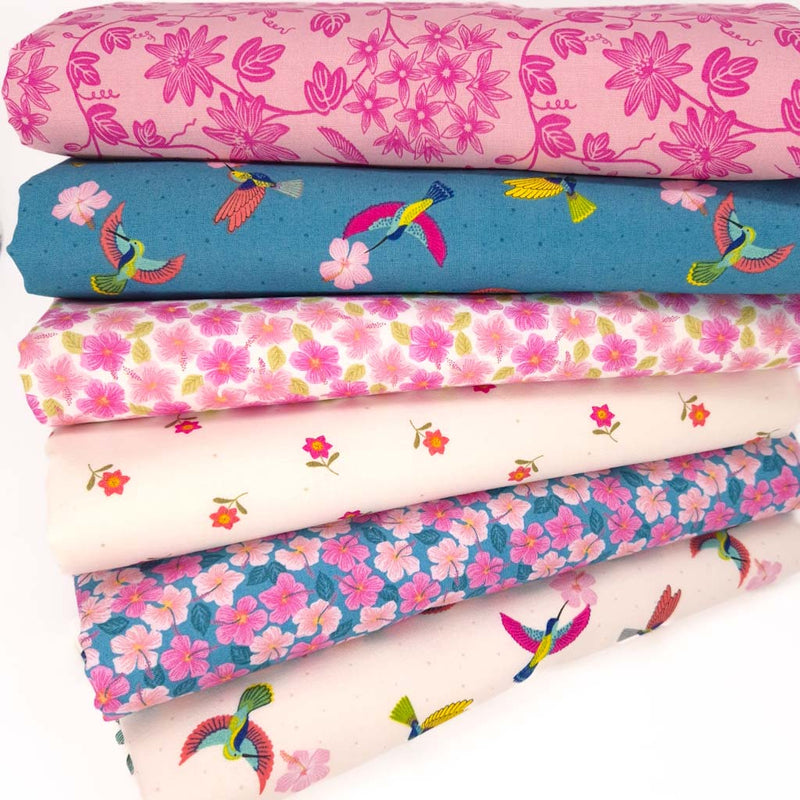 A cotton fat quarter bundle with hibiscus florals and hummingbirds by Lewis & Irene