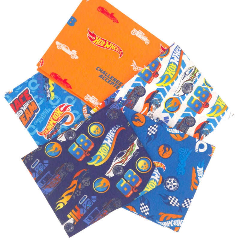 A fat quarter bundle of five Hot Wheels fabric prints