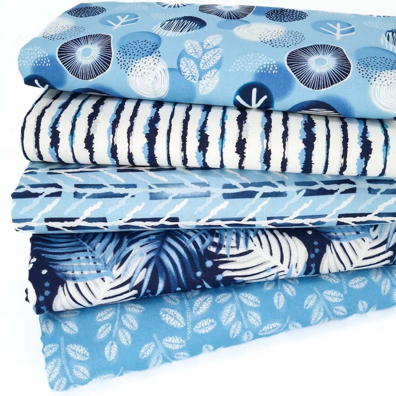 A fat quarter bundle of five cotton fabrics with blue florals and stripes
