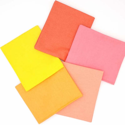 A fat quarter bundle of five pastel cotton fabrics