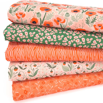 A fat quarter bundle with poppy flowers in orange and green colourways