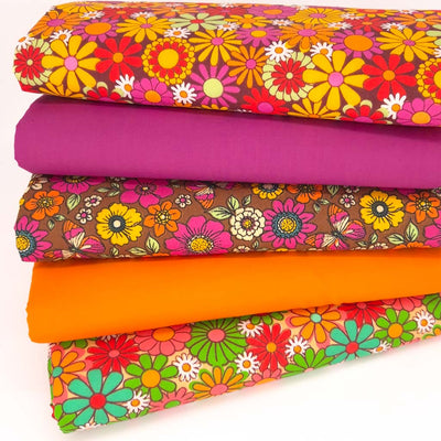 A fat quarter bundle of 5 polycotton retro floral printed fabrics